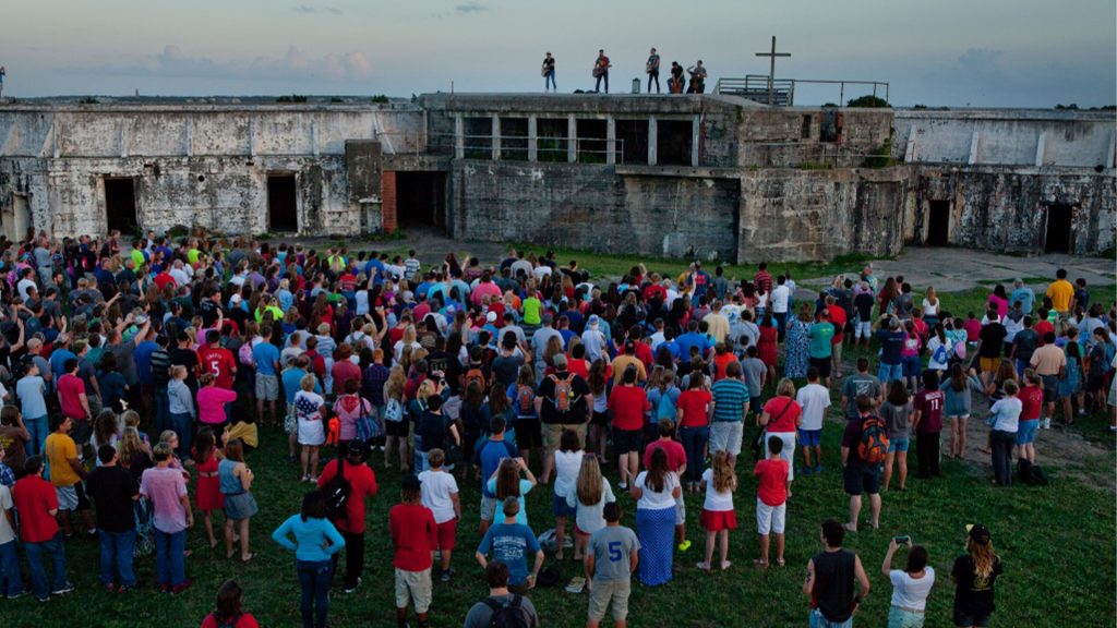 Students gathered at Fort Caswell for worship
